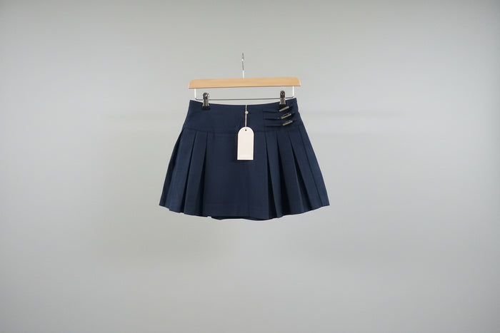 MESHKI Angie Pleated Buckle Mini Skirt- Dark Navy