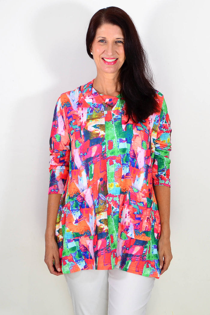 Wishstone multicolour abstract print tunic top with long sleeves and a relaxed fit, shown on a hanger.