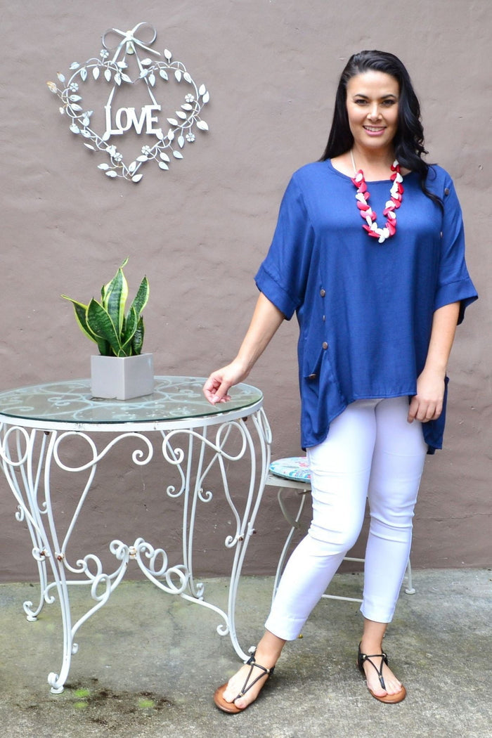 Navy blue Wishstone coconut button sloping sleeve tunic top with pleated design and relaxed fit, shown on a model.
