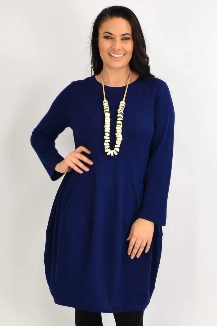 Navy blue cocoon winter pocket tunic dress by Peony with a relaxed fit, long sleeves, and side pockets, ideal for cold weather.