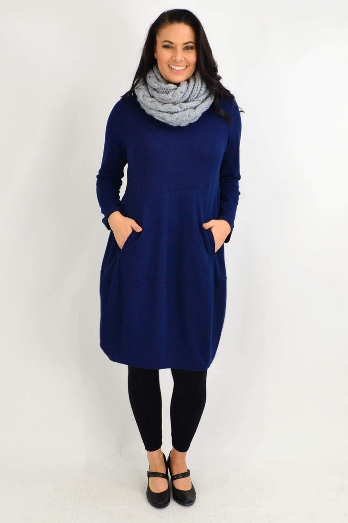 Navy blue cocoon winter pocket tunic dress by Peony featuring a relaxed fit and cozy design, displayed on a hanger.