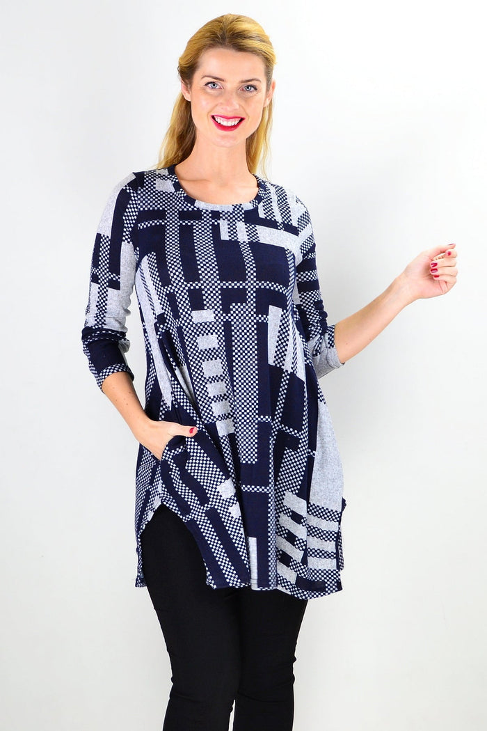 Navy blue and grey knit tunic top by Hourglass featuring a relaxed fit and textured fabric, perfect for casual wear.