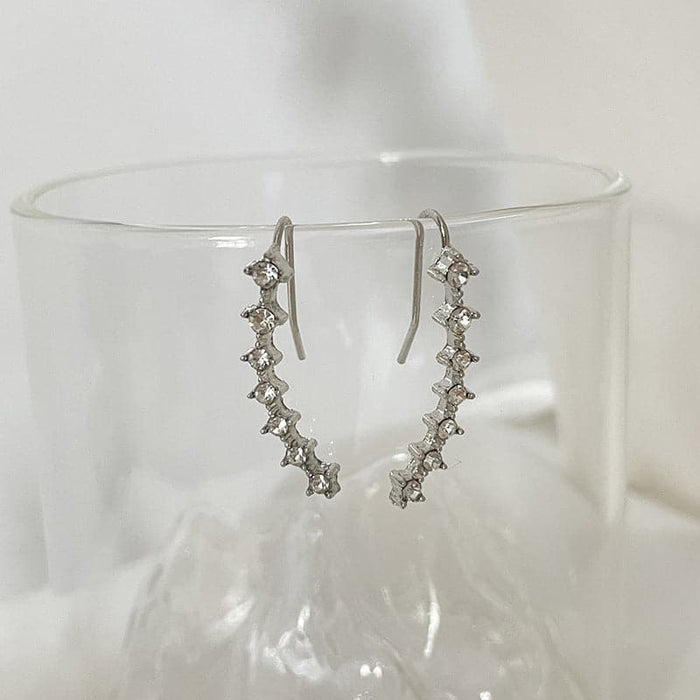 Océane - Boucles d'oreilles sept étoiles scintillantes