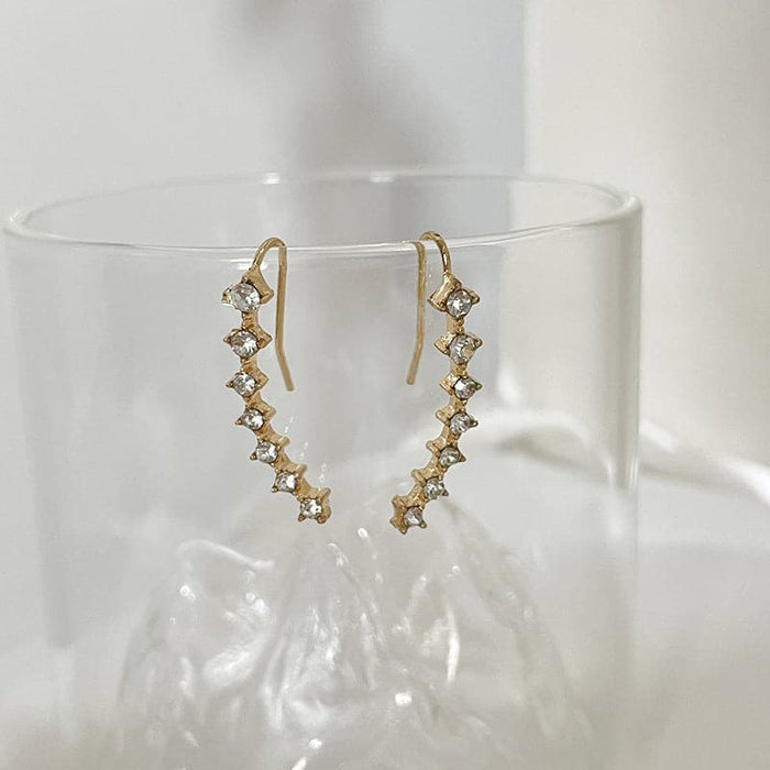 Océane - Boucles d'oreilles sept étoiles scintillantes