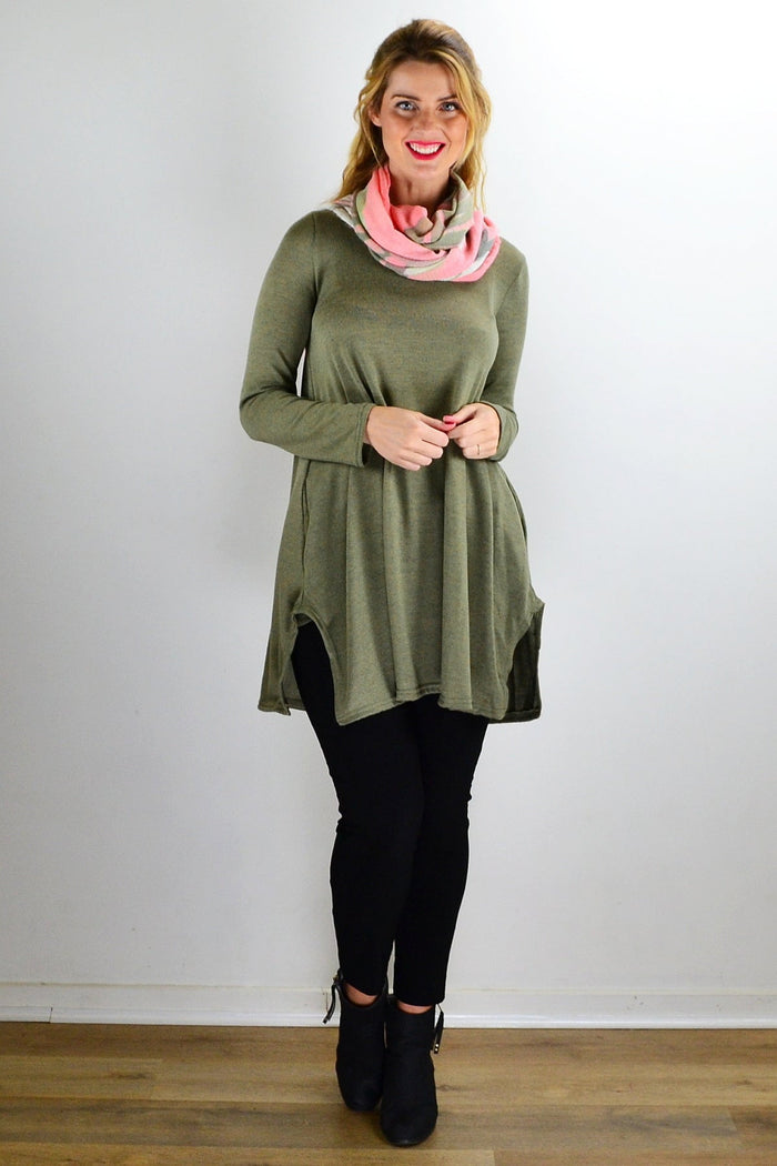 Olive green knit tunic top by Hourglass, featuring a relaxed fit and textured fabric, suitable for casual or layered outfits.