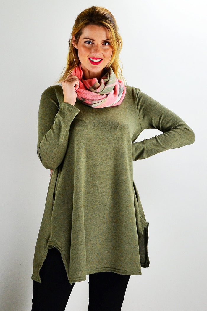 Olive green knit tunic top by Hourglass, shown on a hanger with a relaxed fit and textured fabric.