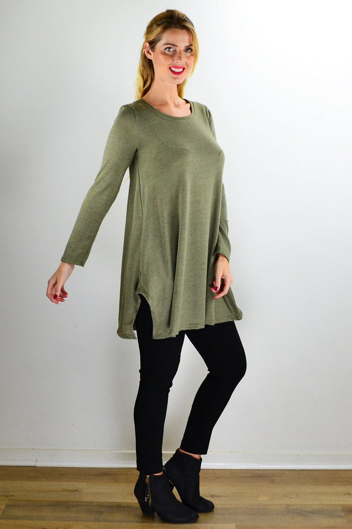 Olive green knit tunic top by Hourglass, front view showing relaxed fit and cozy fabric with long sleeves.