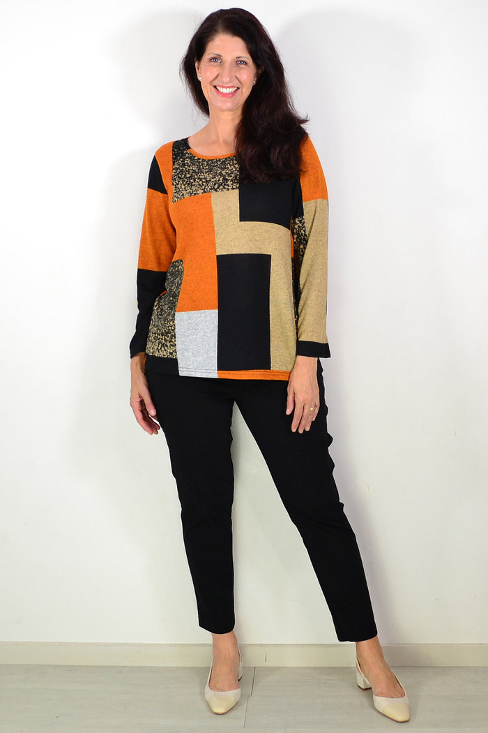 Orange and black geometric print tunic top by Hourglass, featuring a stylish and comfortable design for casual wear.