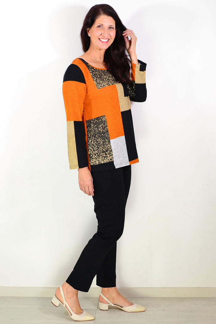 Orange and black geometric print tunic top by Hourglass, featuring a stylish, flowy design perfect for casual or dressy wear.