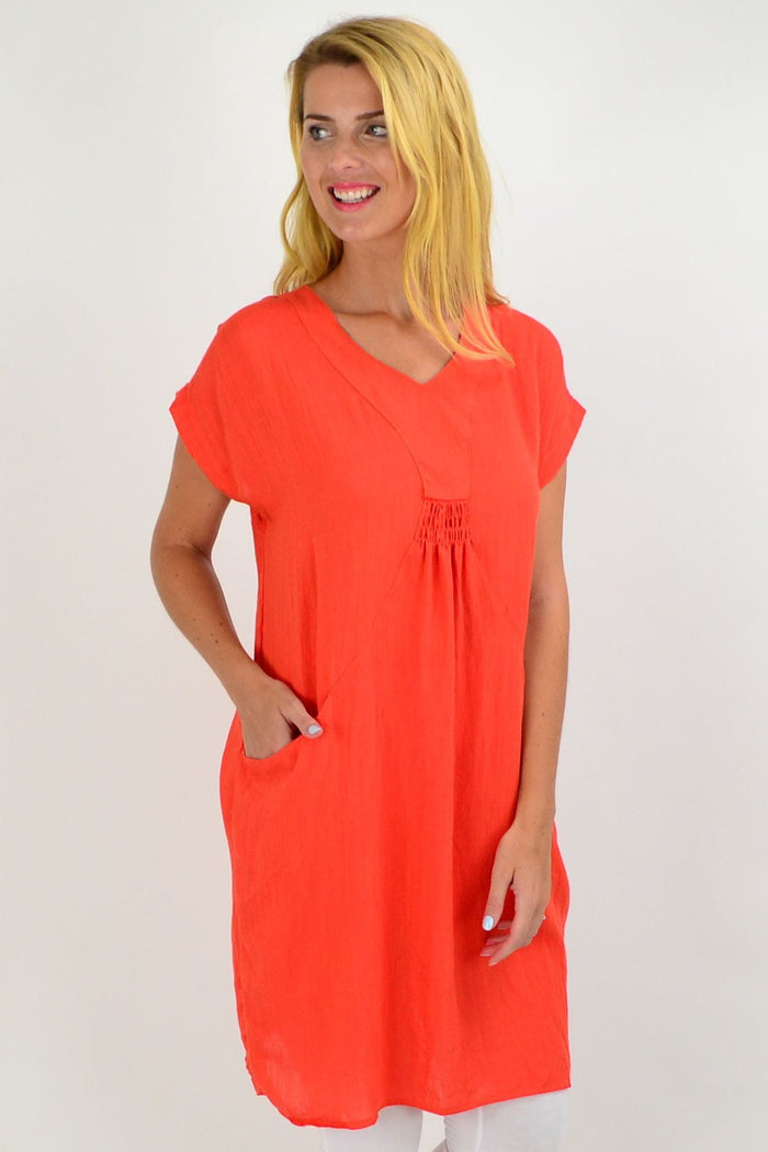 Orange Willow Tree tunic dress featuring a relaxed fit and stylish design, perfect for casual or daytime wear.