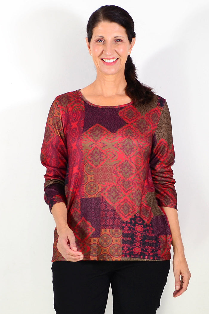Red oriental print tunic top by Hourglass featuring vibrant patterns and a relaxed fit, perfect for mature fashion styles.