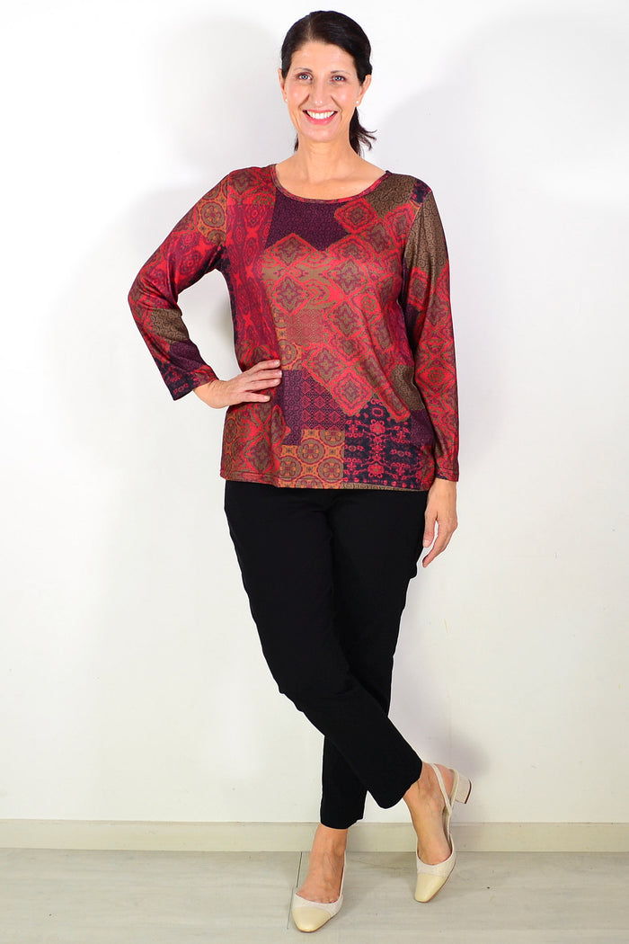 Red Oriental print tunic top by Hourglass, featuring intricate patterns and a comfortable, stylish fit for mature fashion.