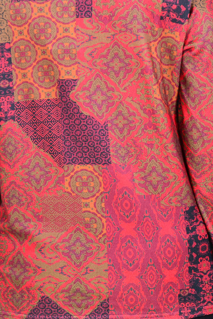 Red Oriental print tunic top by Hourglass featuring intricate patterns, casual fit, and vibrant colors, perfect for relaxed fashion.