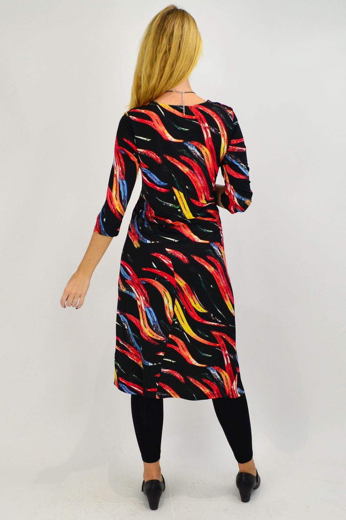 Vuios Paint Splash Midi Tunic Dress hanging on a hanger with colorful paint splash design and flowing midi length fabric.