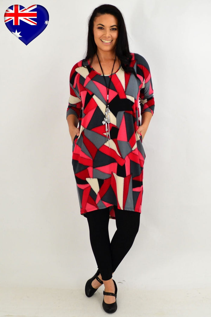 Patchwork hi-low tunic dress by Four Girlz featuring a colorful, bohemian-inspired design and relaxed fit.