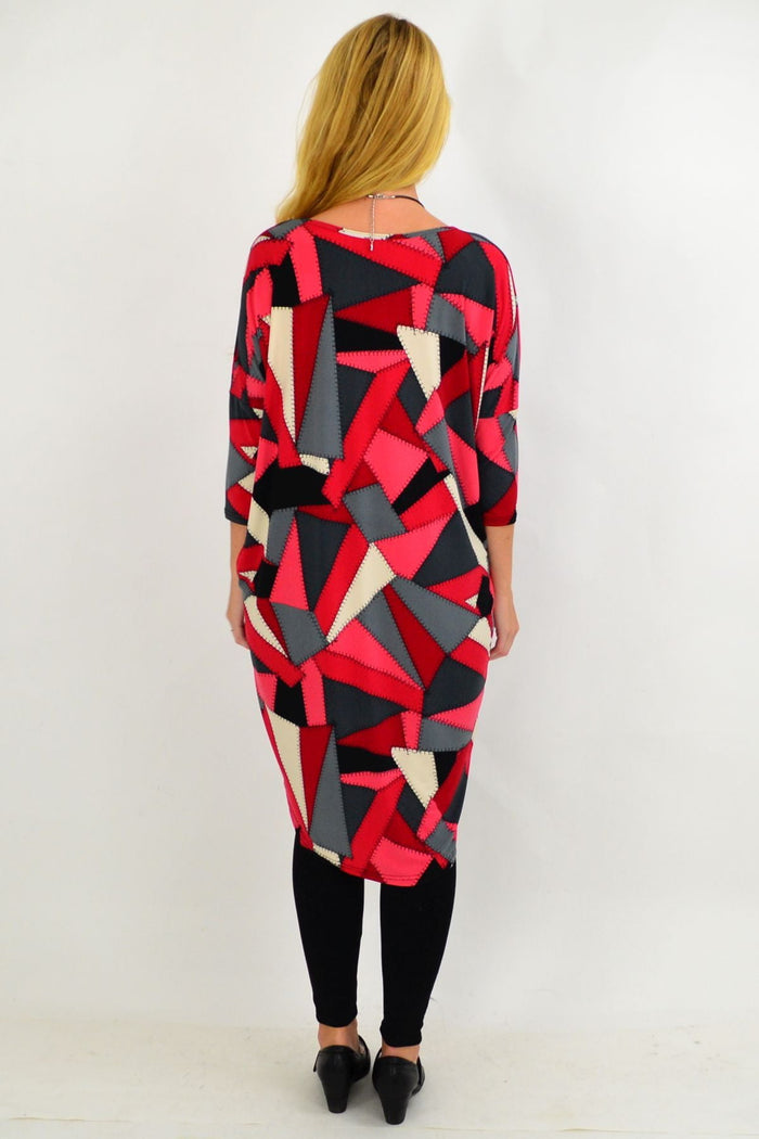 Red and grey patchwork hi-low tunic dress by Four Girlz, featuring a stylish and comfortable women's tunic with a flowy hem.