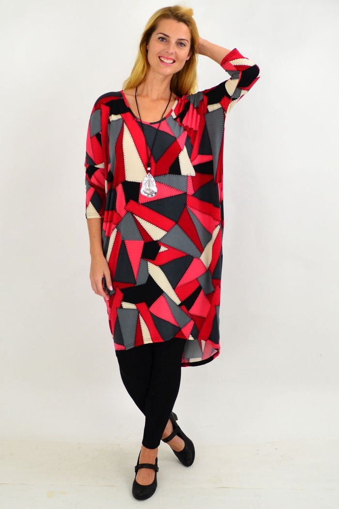 Red and grey patchwork hi-low tunic dress by Four Girlz, featuring a stylish, flowy design perfect for casual wear.