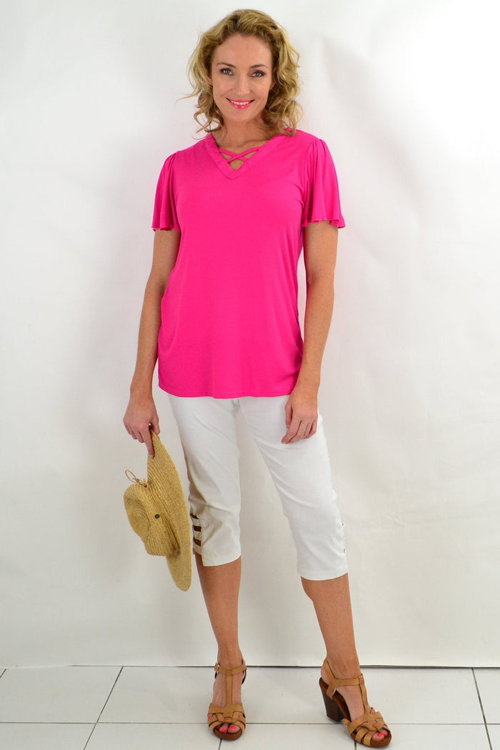 Pink diamond flutter sleeve tunic tee by I Love Tunics, featuring a relaxed fit with flutter sleeves and a soft pink fabric.