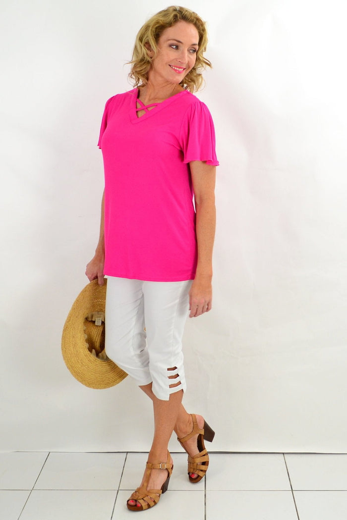 Pink diamond flutter sleeve tunic tee by I Love Tunics, featuring a relaxed fit and lightweight fabric with flutter sleeves.