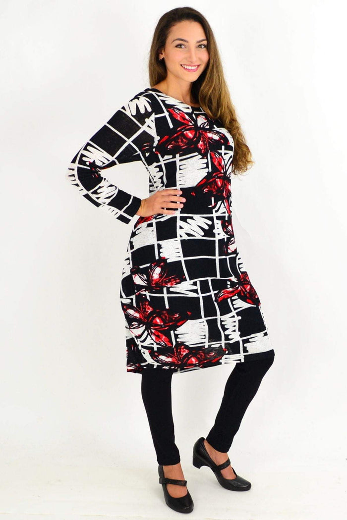 Red butterfly cocoon tunic dress by Vuios, showcasing a flowing, loose-fitting tunic with butterfly-inspired design details.