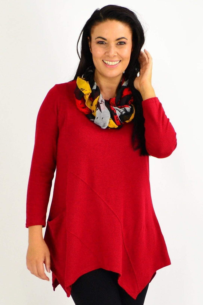 Red rust Peony winter tunic top with pocket detail, long sleeves, and comfortable fit, perfect for layered winter outfits.