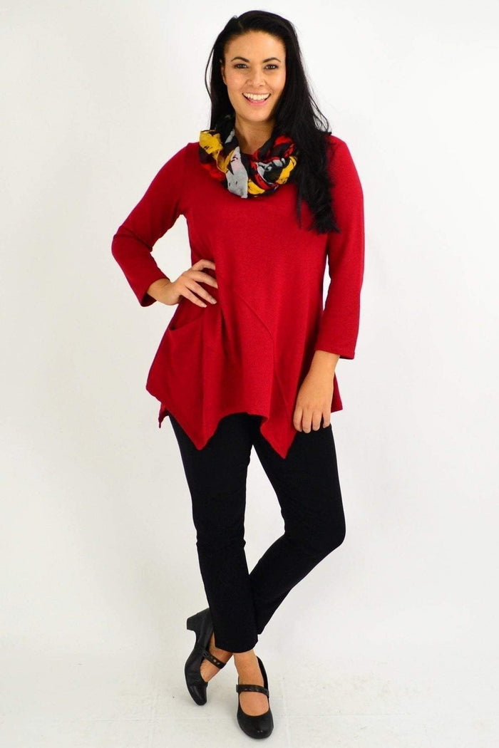 Red rust Peony pocket winter tunic top with long sleeves and a relaxed fit, shown on a mannequin.