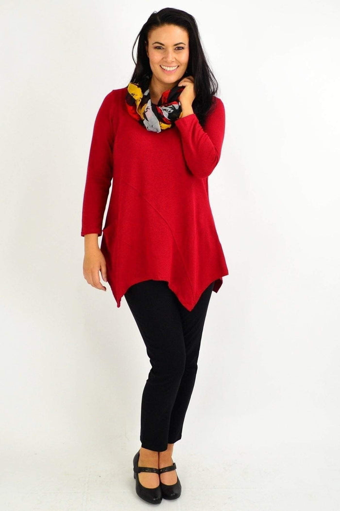 Red rust Peony winter tunic top with pocket detail, featuring a relaxed fit and long sleeves for cold weather comfort.