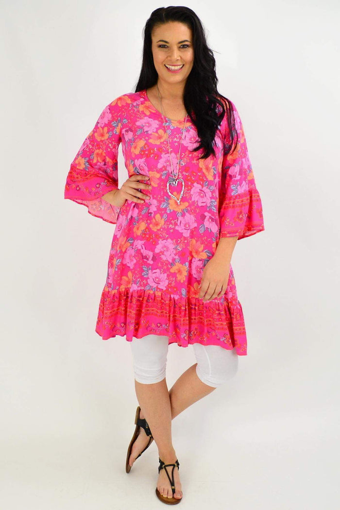 Rose pink Lottie Tier Tunic Dress by Boho Australia with floral pattern, flowing fabric, and tiered design.