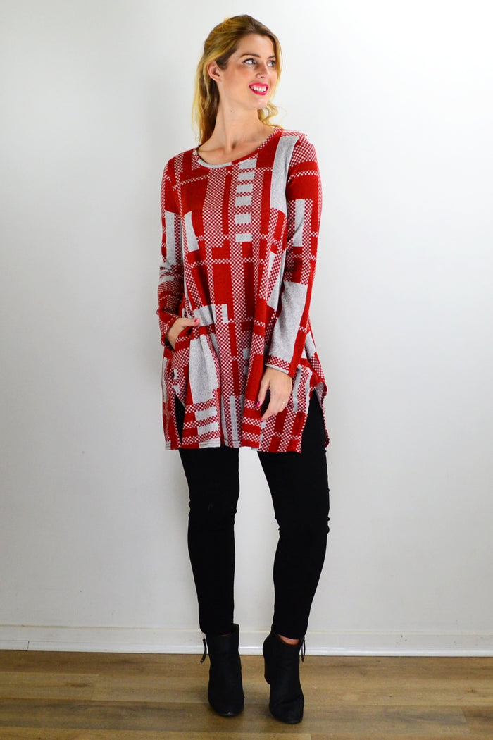 Rust Grey Knit Tunic Top by Hourglass, featuring a cozy, textured knit fabric and a relaxed fit, displayed on a hanger.