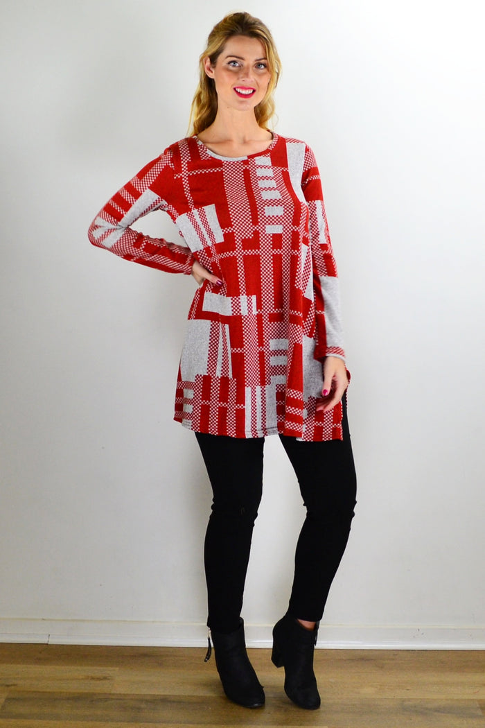 Rust grey knit tunic top from Hourglass, featuring a cozy, textured fabric and a relaxed fit, ideal for casual wear.