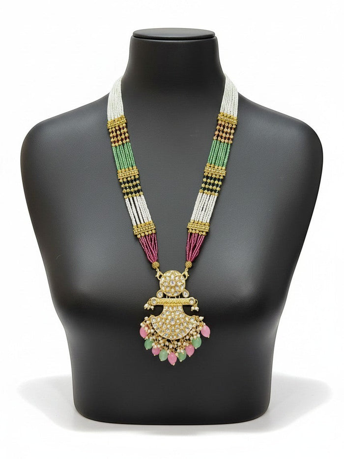 Kurti Connection USA multi-strand beaded necklace with a gold-tone kundan pendant, pearl accents, and teardrop beads.