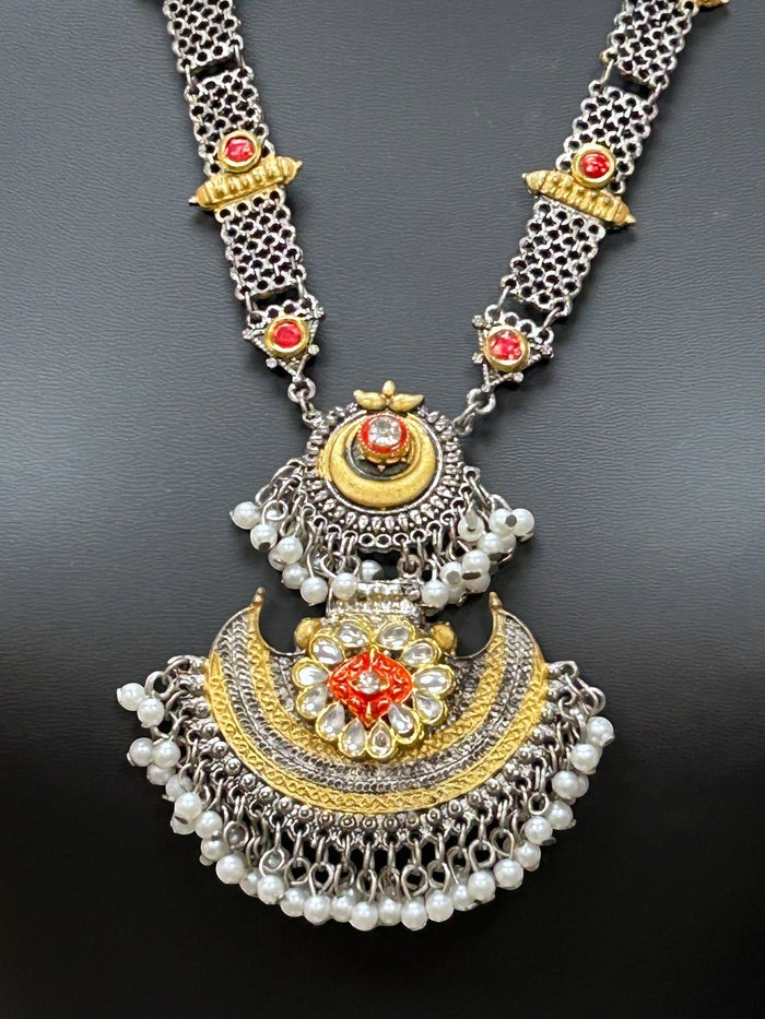 Kurti Connection USA traditional ethnic statement necklace with oxidized silver, gold accents, red stones, and pearls.