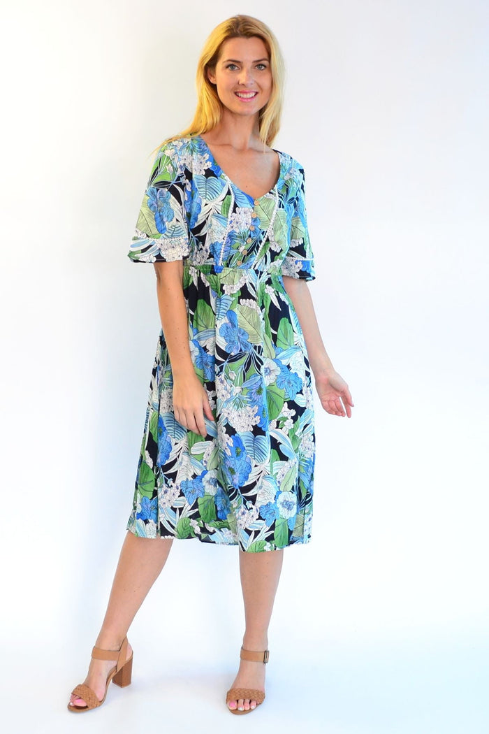Tropical Lace Trim Aztec Haze Zen Garden tunic dress featuring intricate lace details and vibrant aztec pattern fabric.