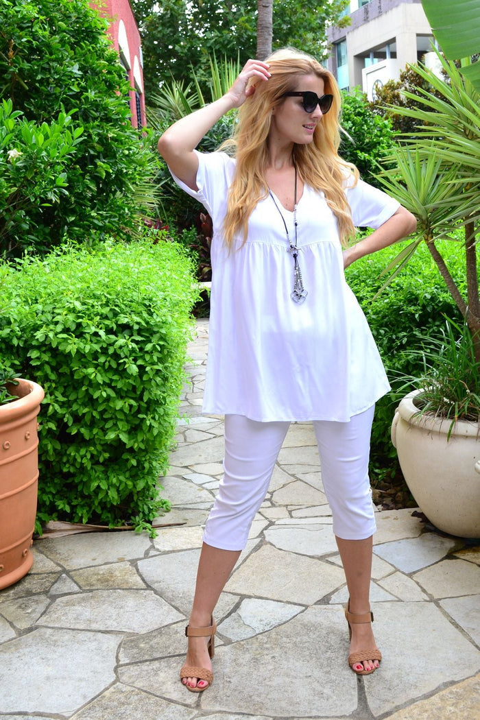 White beach day tunic top from HQ, lightweight and flowy with a relaxed fit, perfect for summer beachwear.