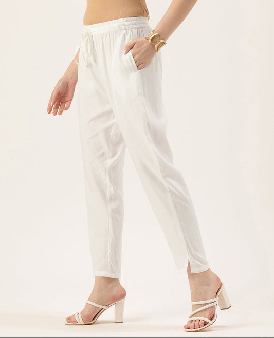 Person wearing white pants on a plain background, White Solid Pencil Pant