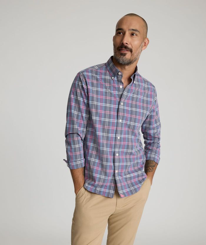 Model is wearing UNTUCKit Wrinkle-Free Camden Shirt in multi color.