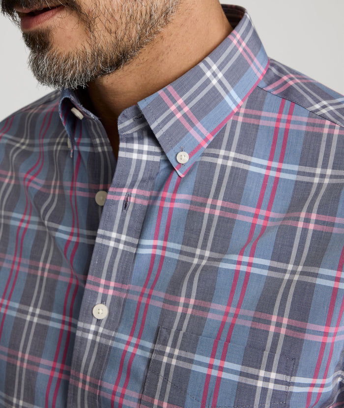 Model is wearing UNTUCKit Wrinkle-Free Camden Shirt in multi color.