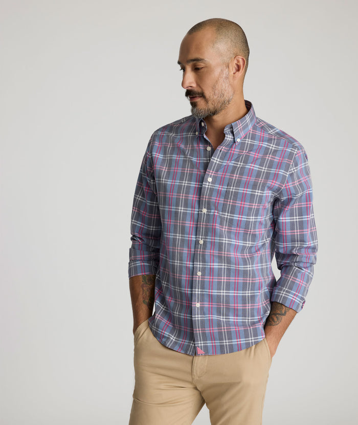 Model is wearing UNTUCKit Wrinkle-Free Camden Shirt in multi color.