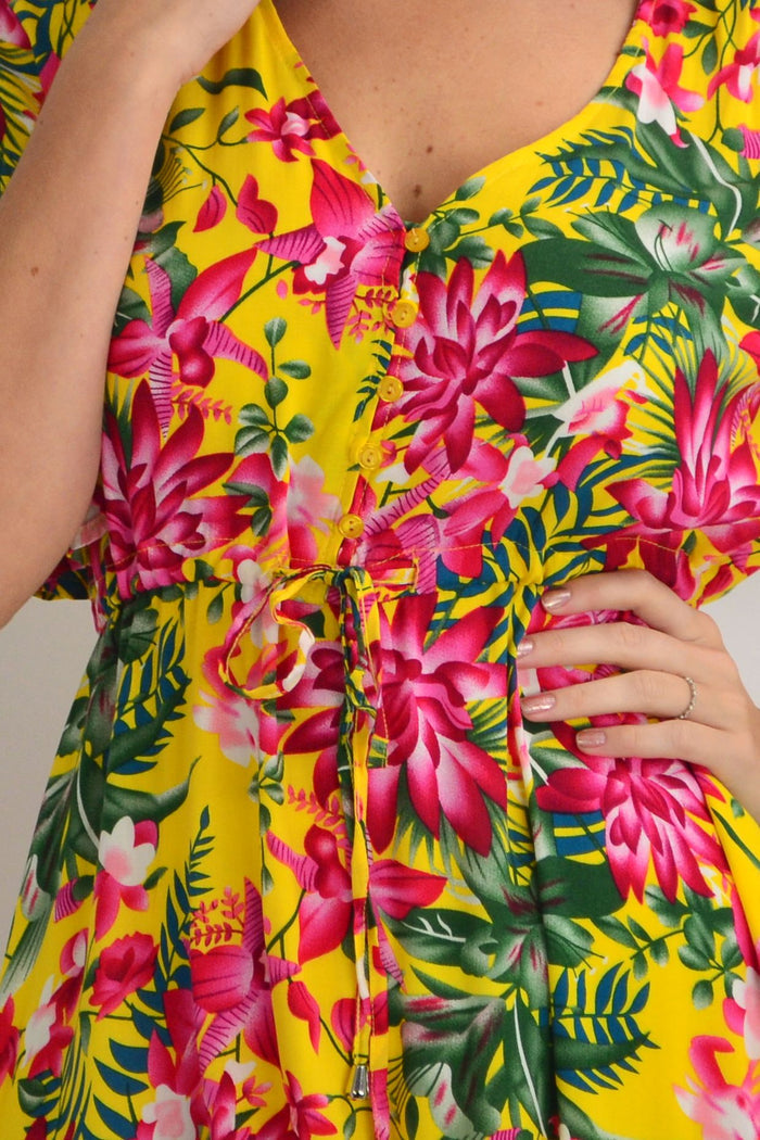 Yellow frilly orchid tunic dress by Willow Tree featuring floral pattern and flowing fabric, perfect for casual or dressy wear.