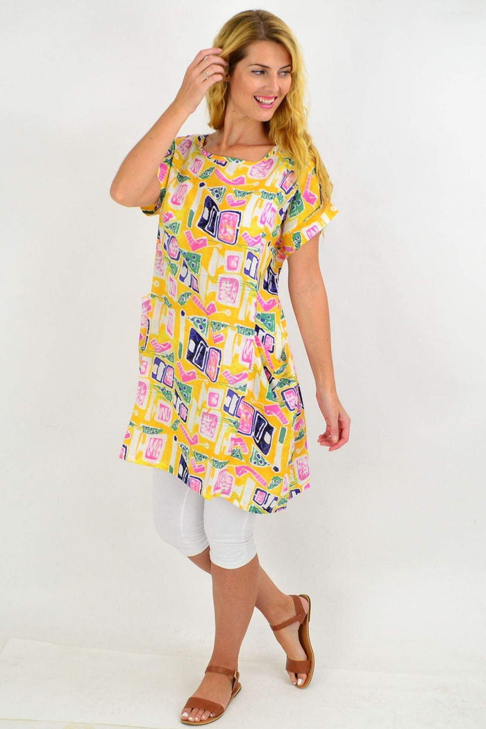 Yellow teen tunic dress by Peony, showcasing a casual, flowy design with long sleeves and a relaxed fit.
